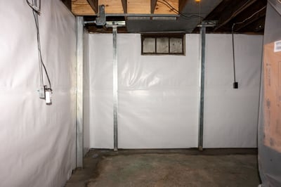 Power-Brace-Wall-Anchor-Goodells-2024- 103After shot of two bowed parameter walls with power braces installed on them to support the foundation