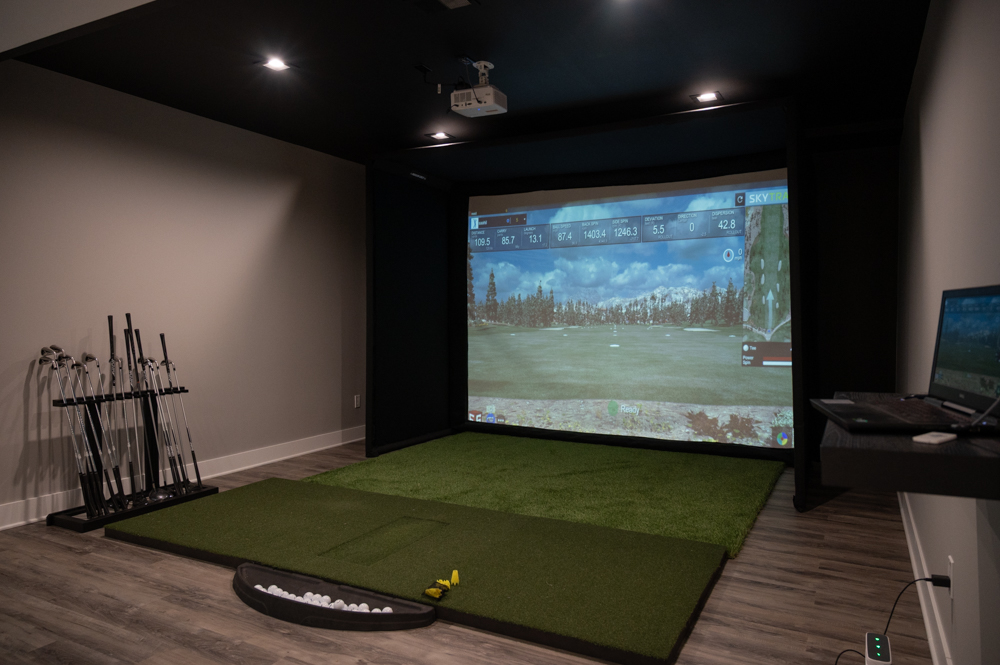 Finished Basement with Bar, Wine Room, Bathroom, Gym and Golf Simulator in Rochester, MI