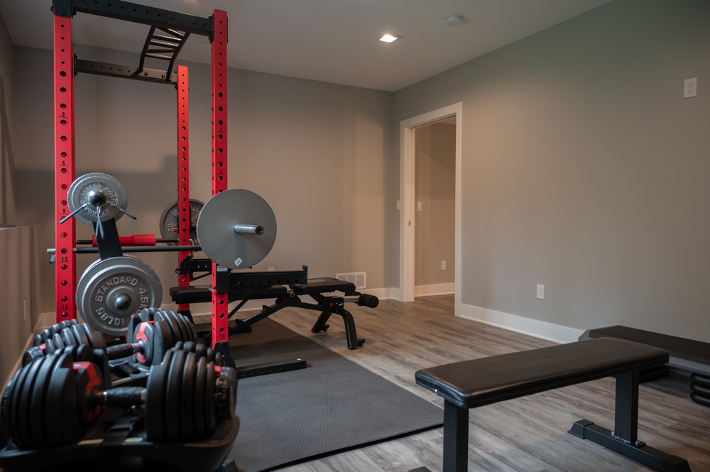 Finished Basement with Bar, Wine Room, Bathroom, Gym and Golf Simulator in Rochester, MI