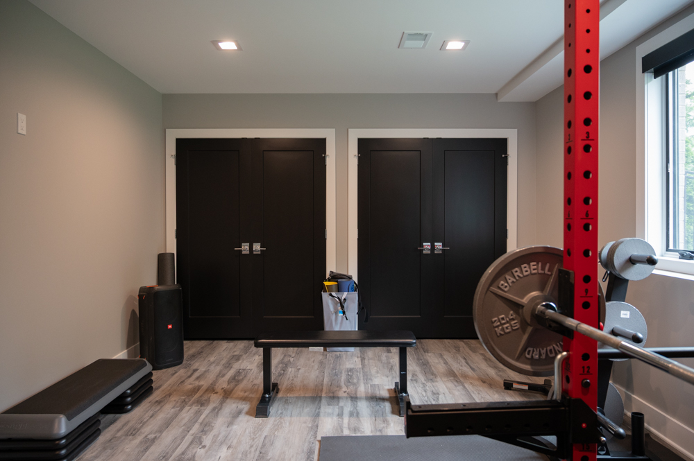 Finished Basement with Bar, Wine Room, Bathroom, Gym and Golf Simulator in Rochester, MI