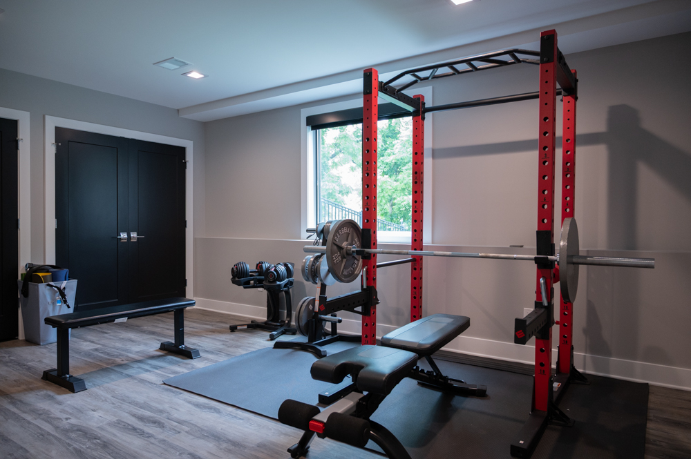 Finished Basement with Bar, Wine Room, Bathroom, Gym and Golf Simulator in Rochester, MI