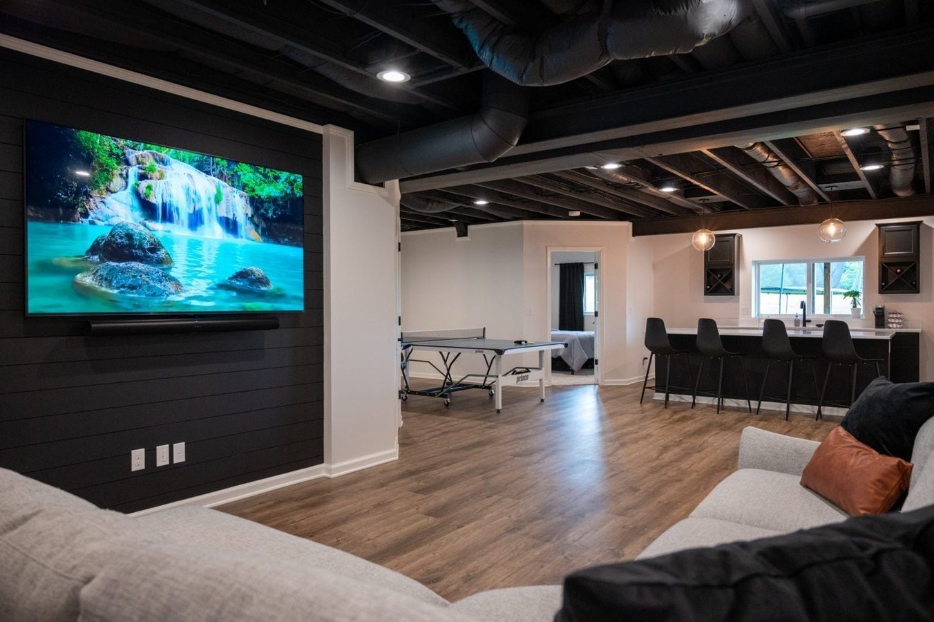 Finished Basement with Guest Room, Bathroom and Bar in New Hudson, MI