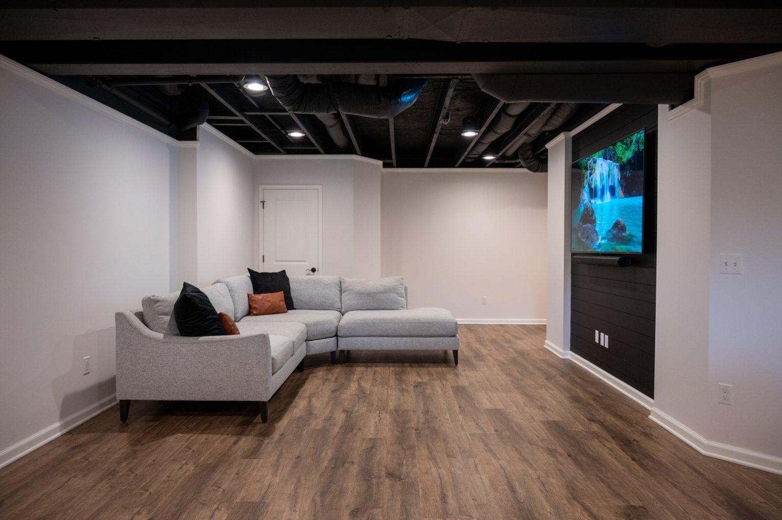 Finished Basement with Guest Room, Bathroom and Bar in New Hudson, MI