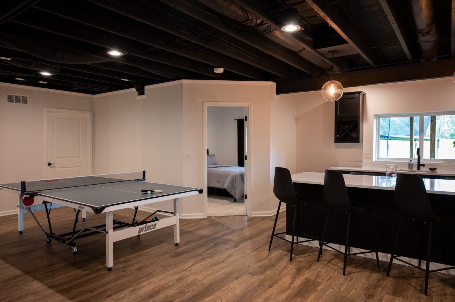 Finished Basement with Guest Room, Bathroom and Bar in New Hudson, MI