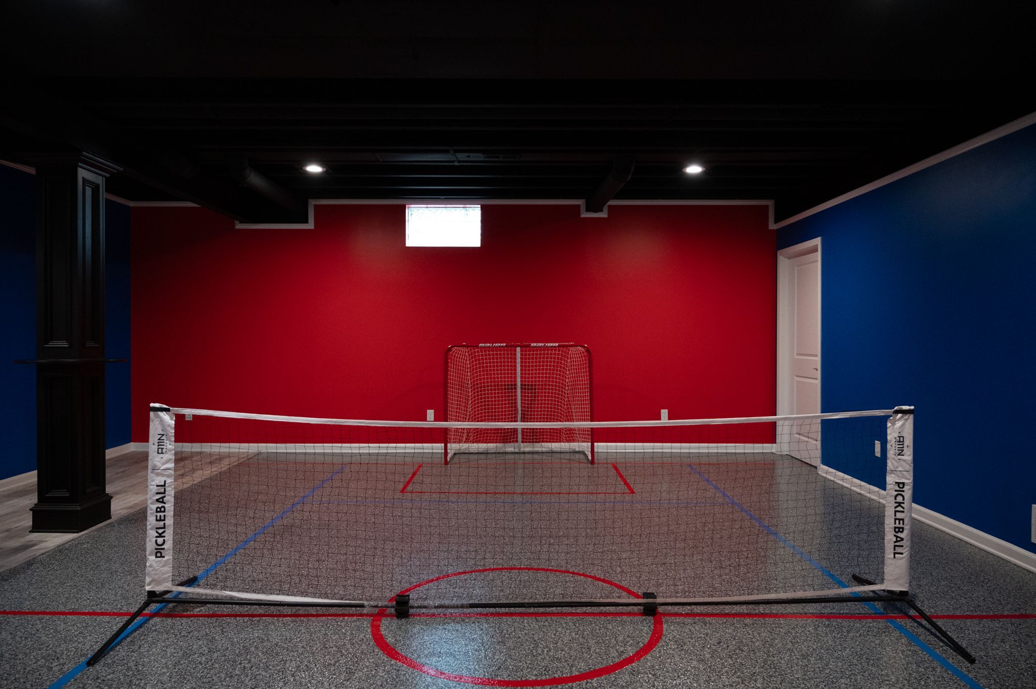 Finished Basement with Pickleball Court in Northville, MI