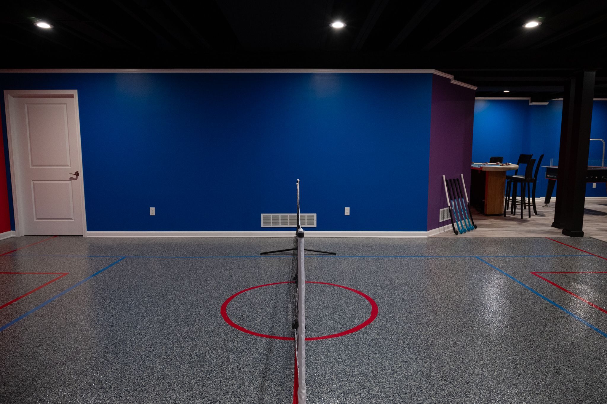 Finished Basement with Pickleball Court in Northville, MI