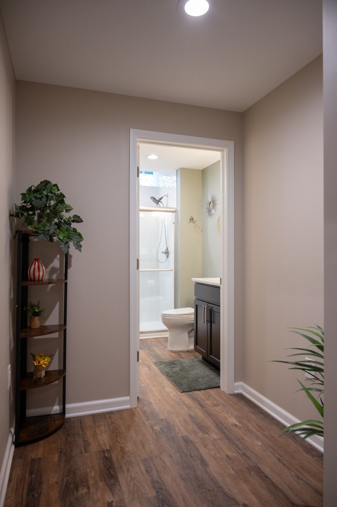 Finished Basement with Seated Bar, Home Gym and Bathroom in Rochester, MI