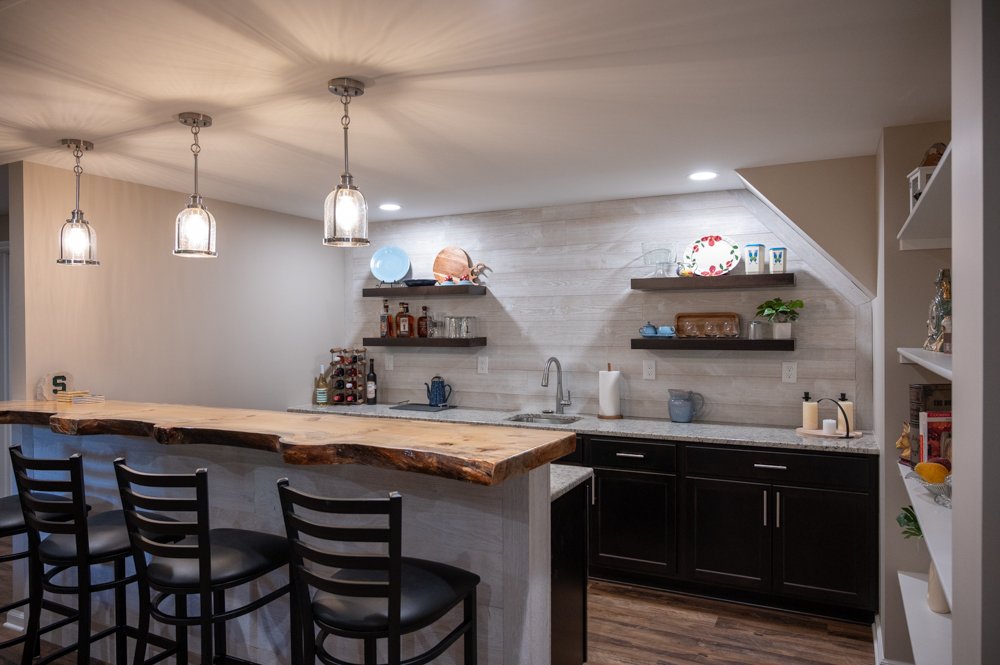 Finished Basement with Seated Bar, Home Gym and Bathroom in Rochester, MI