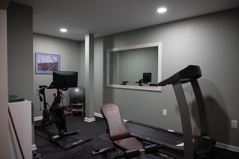 Finished Basement with Seated Bar, Home Gym and Bathroom in Rochester, MI