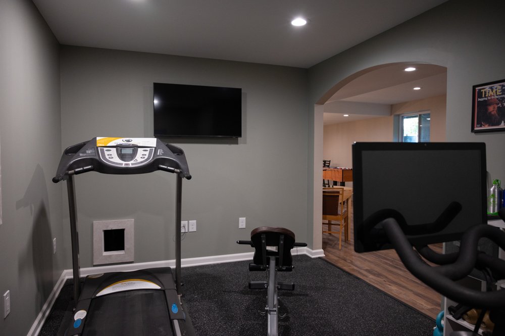 Finished Basement with Seated Bar, Home Gym and Bathroom in Rochester, MI