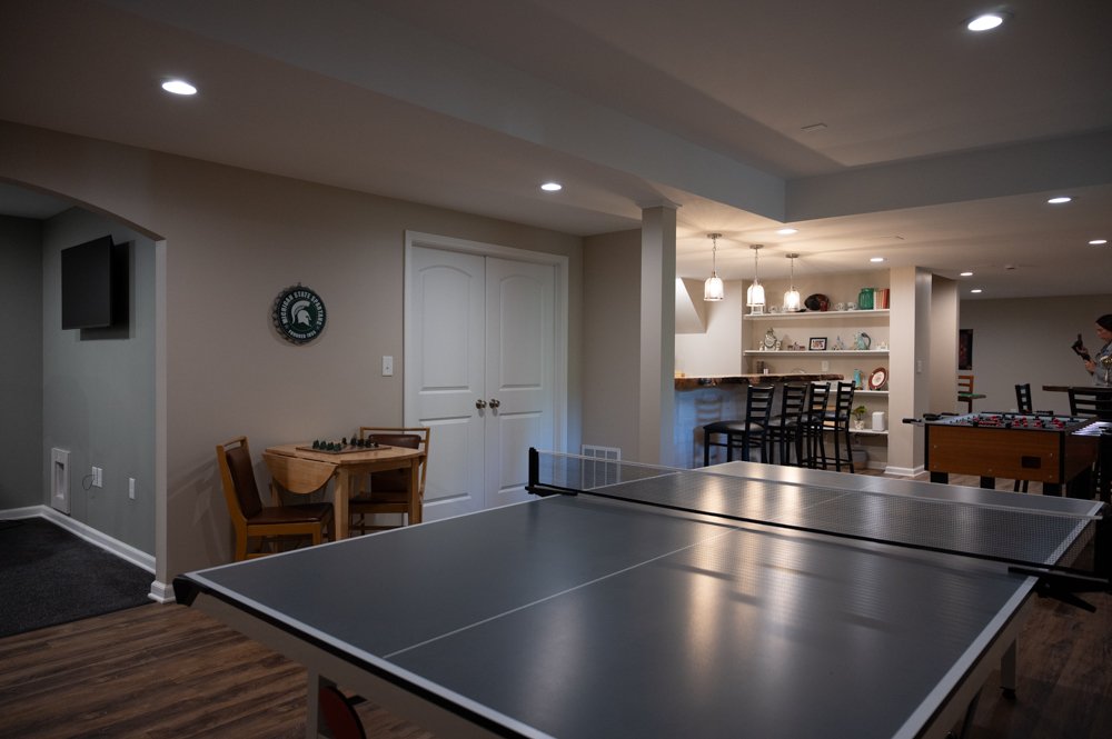 Finished Basement with Seated Bar, Home Gym and Bathroom in Rochester, MI