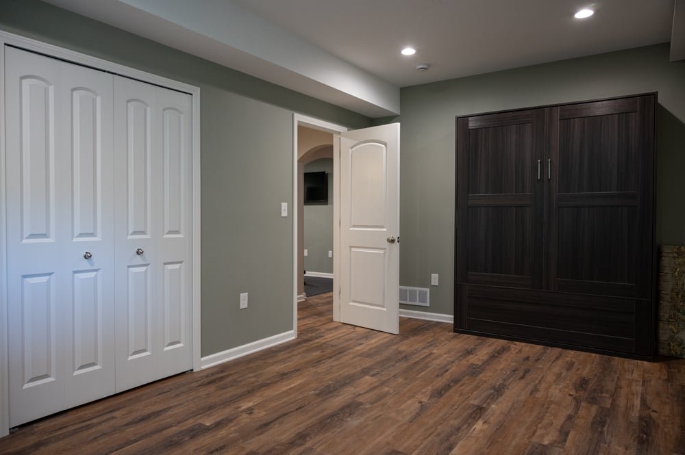 Finished Basement with Seated Bar, Home Gym and Bathroom in Rochester, MI