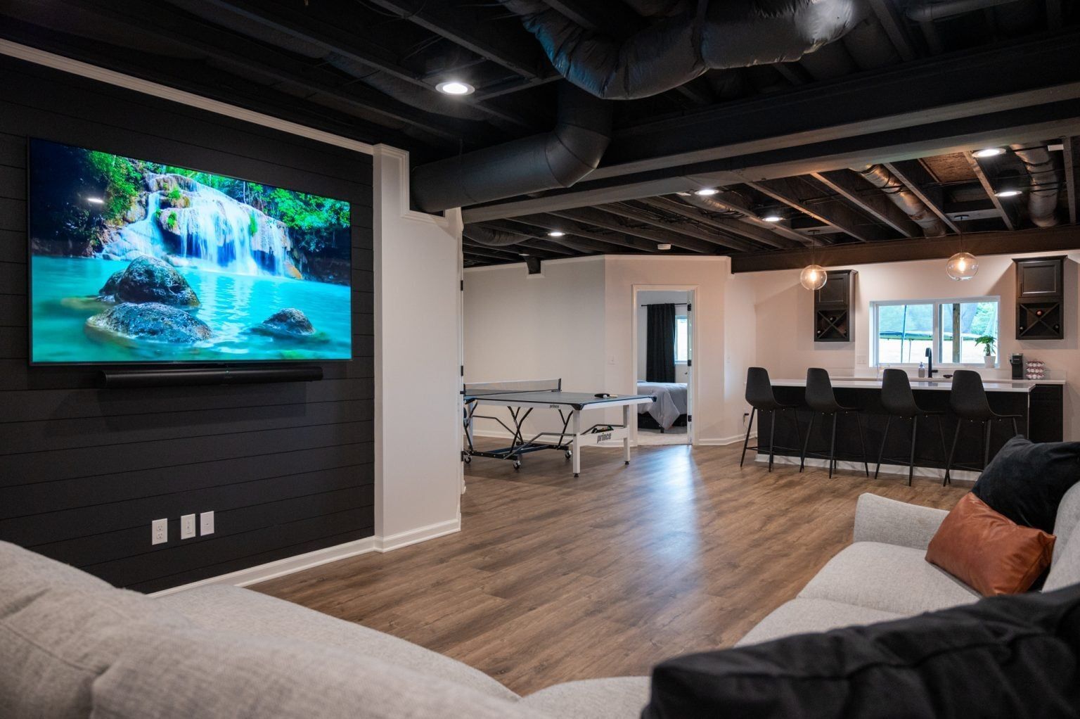 Finished Basement with Guest Room, Bathroom and Bar in New Hudson, MI