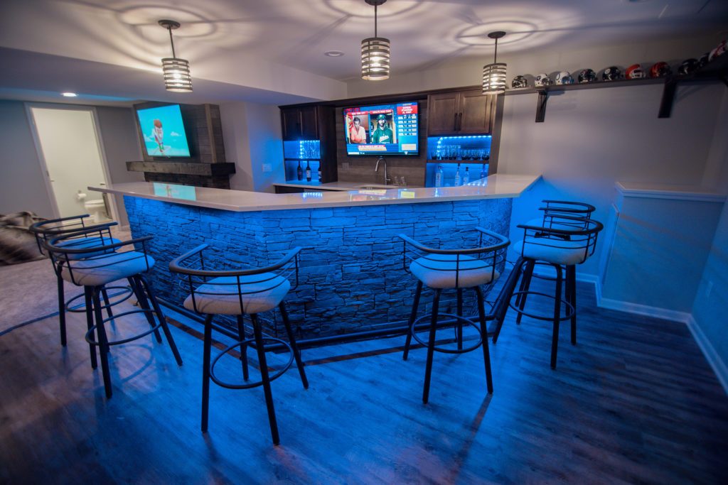 bright led bar with led lighting and stools with stone backing