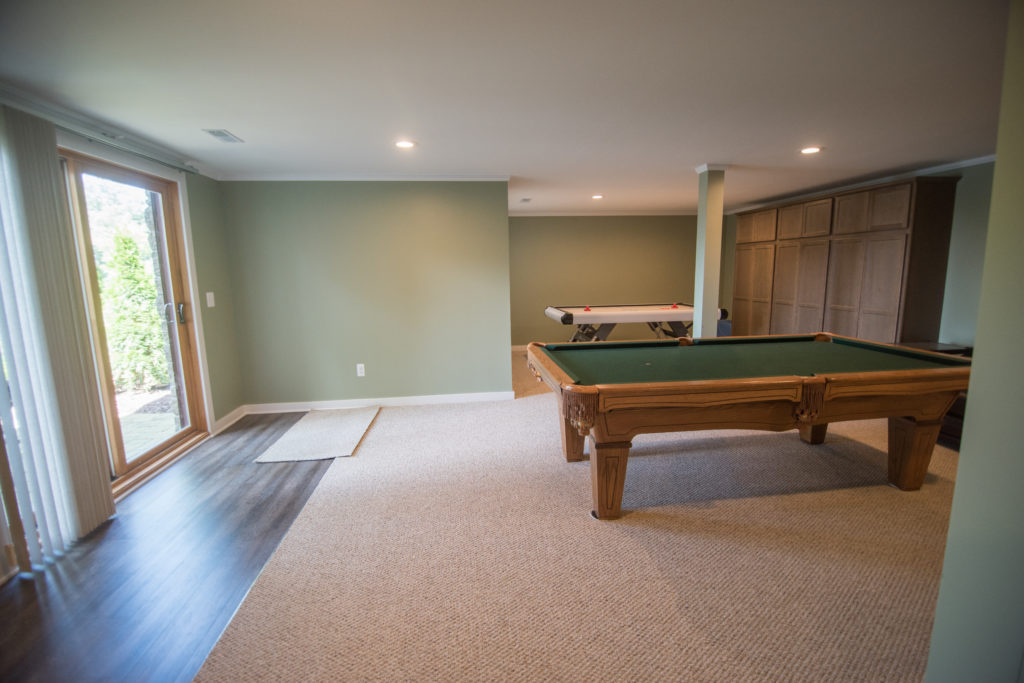 basement walkout with carpet and pool table