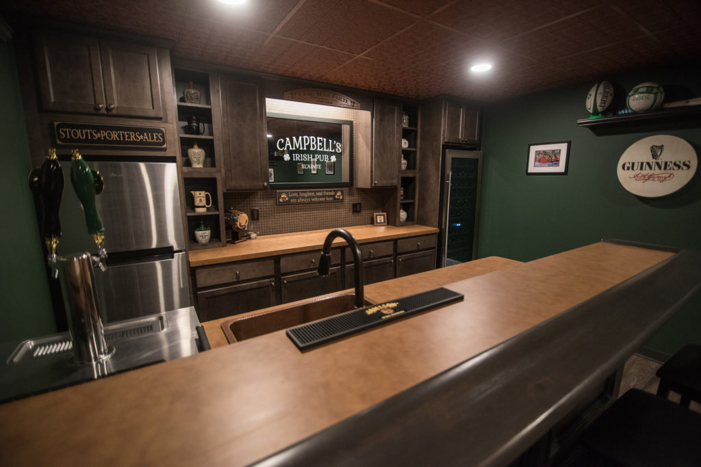 custom finished basement bar with Irish bar