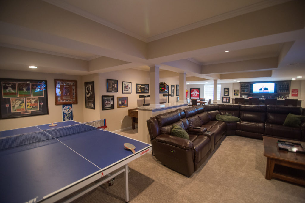 ceiling detail defining the spaces in this finished basement
