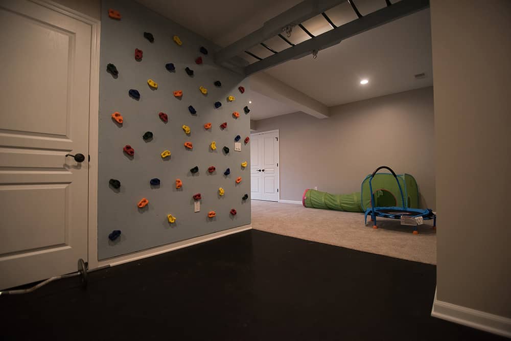 Clarkston, MI Finished Basement with Rock Wall - Finished Basements Plus