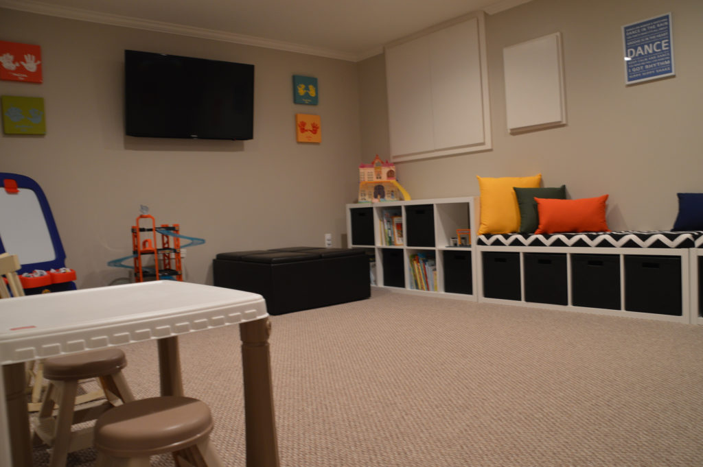 basement playroom for kids storage built in carpet