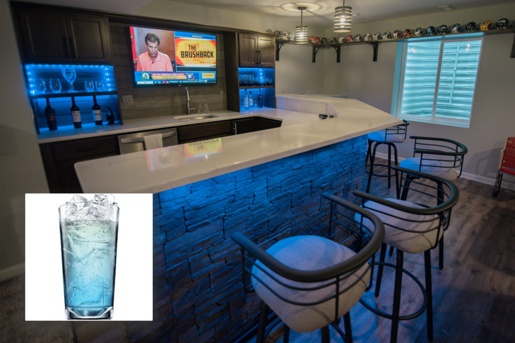 Oakland Township, MI finished basement bar with blue LED lighting inspires Cupids Blue drink