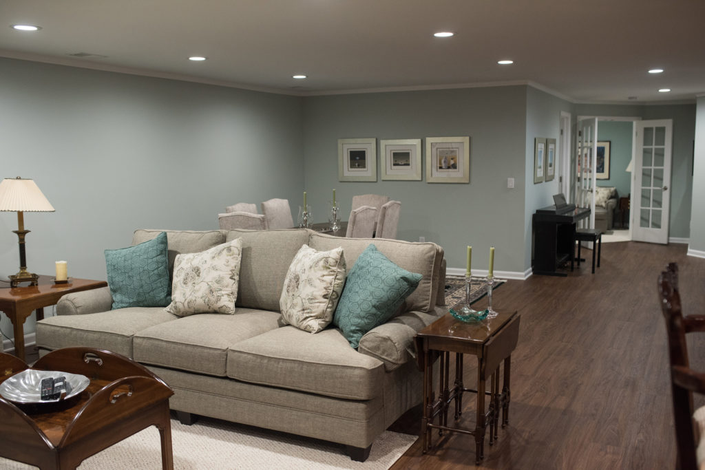 living room and formal dining area in basement