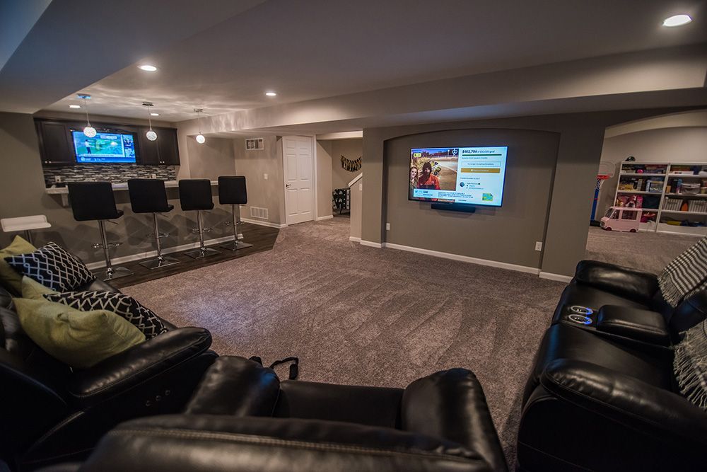 large open basement living room with carpet