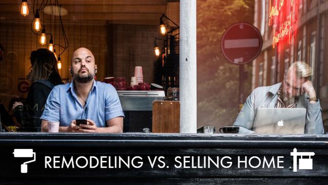 Men sitting at a cafe looking out to the street