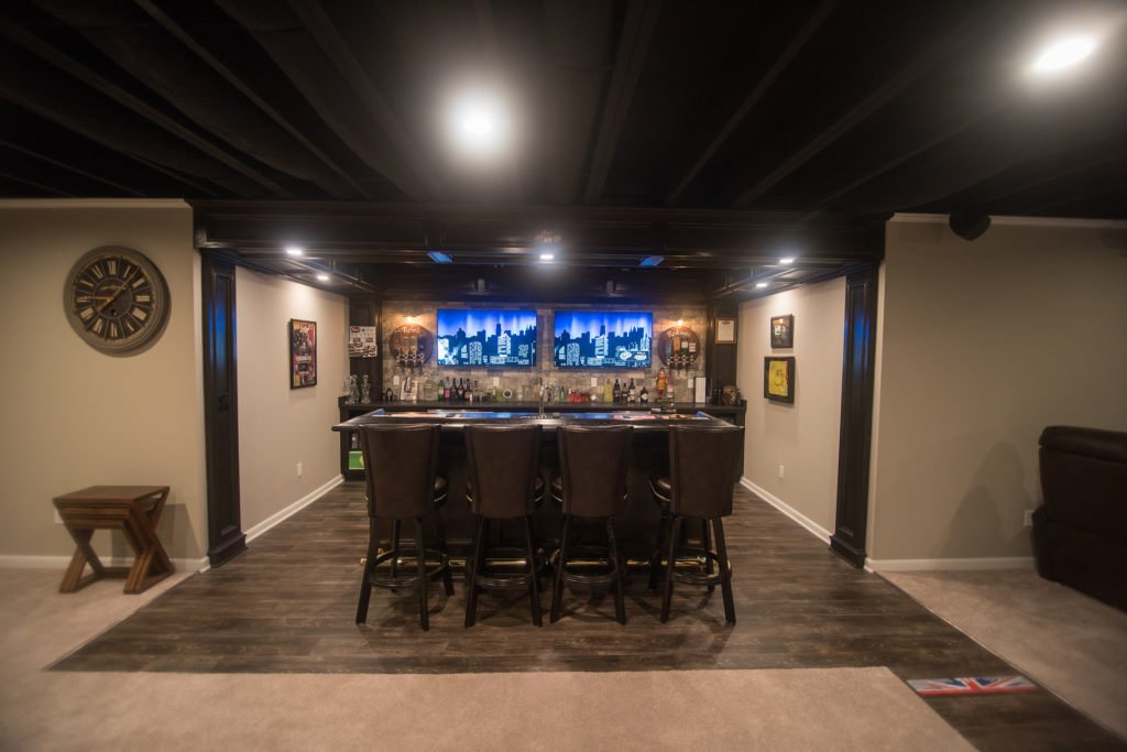 basement bar with brick walls and pub style posts