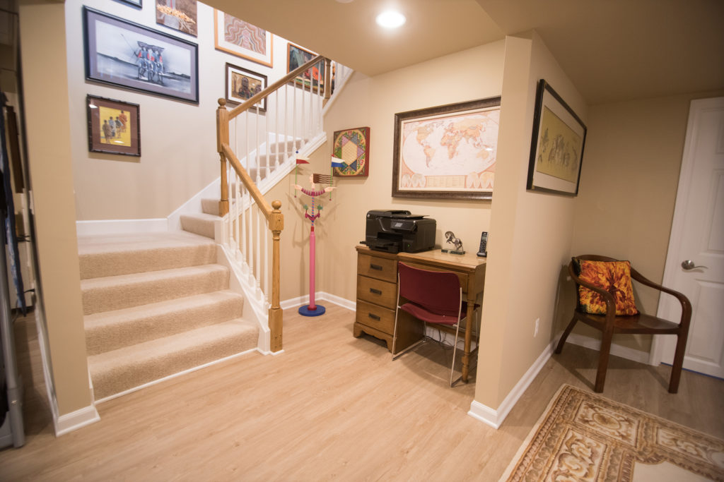 basement staircase with open railing