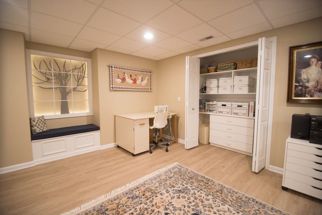 finished basement with closet and faux windows