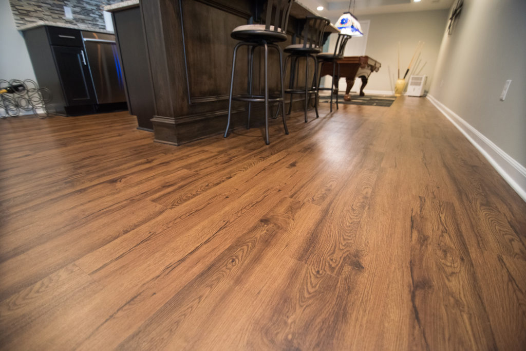 Basement flooring vinyl plank dark brown in Rochester, Michigan