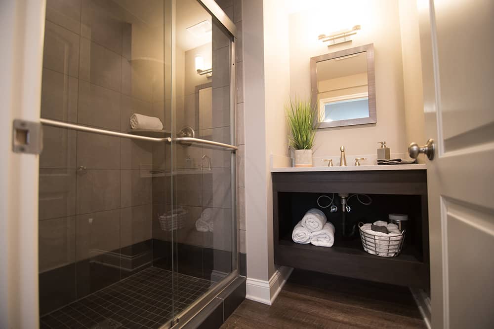 basement bathroom with spa like look and feel floating vanity