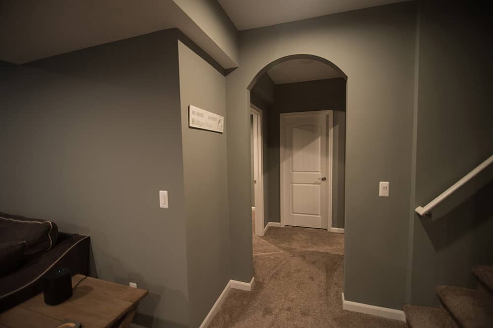 Archway design feature in basement hallway in Royal Oak, Michigan