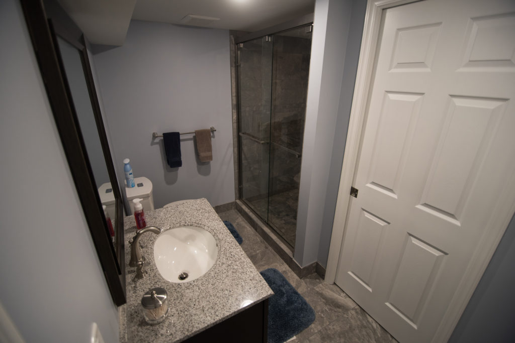 vinyl tile bathroom in basement