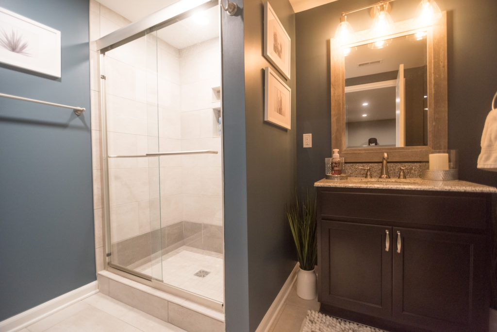 basement bathroom with full shower