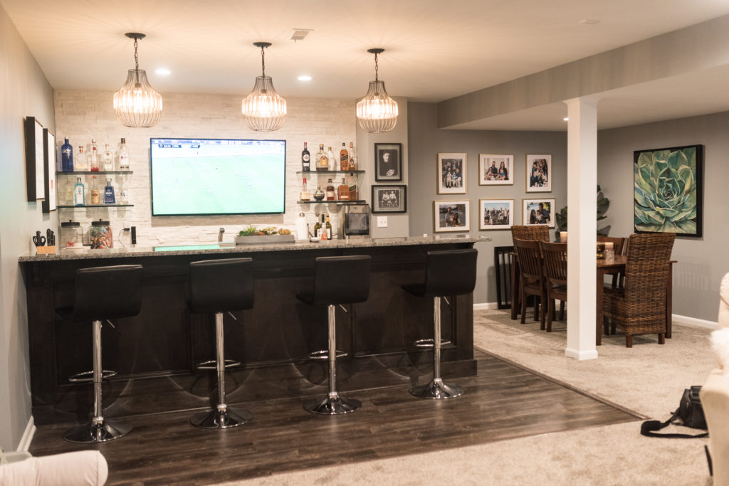 bright bar area with dining space next to it