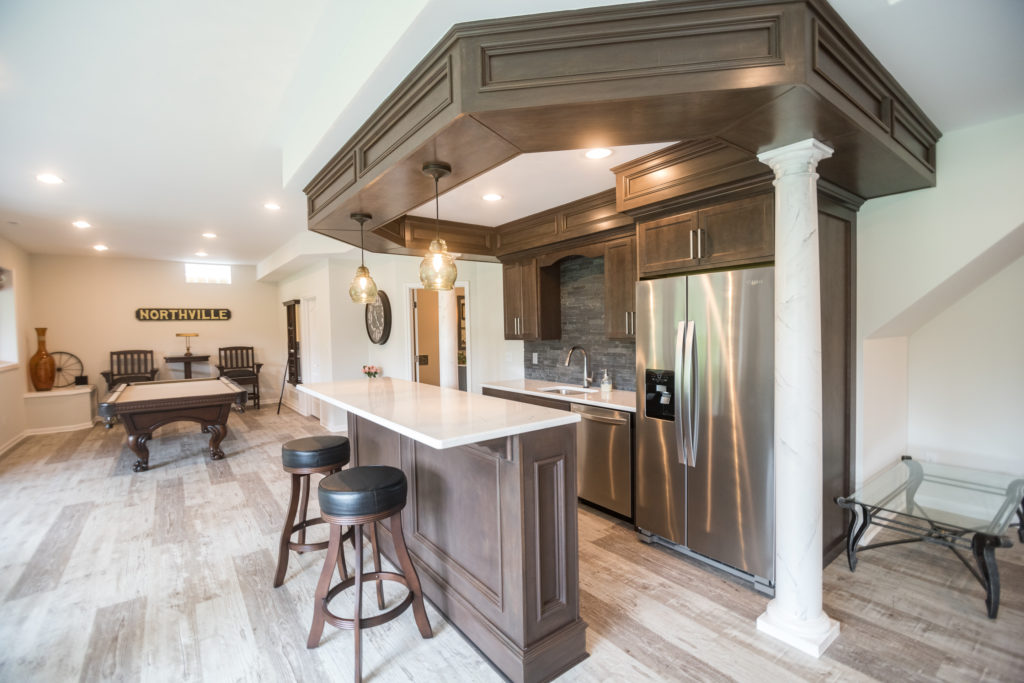 custom bar with dark stain and white posts