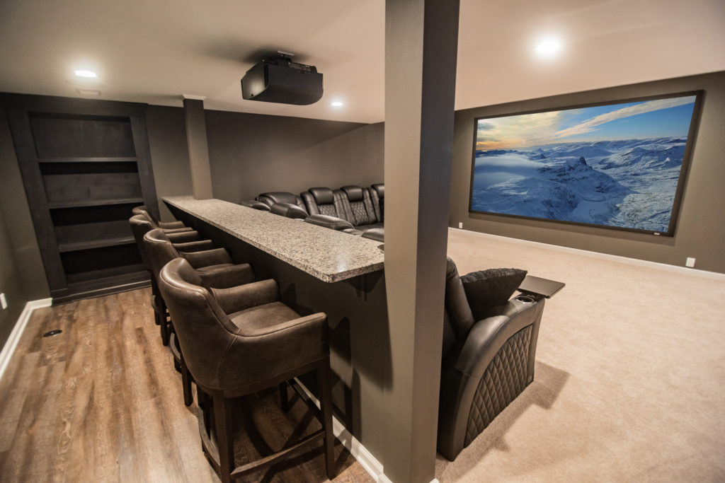 custom bar top behind sofa to view theater
