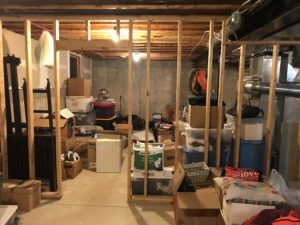 Unfinished basement storage boxes everywhere!