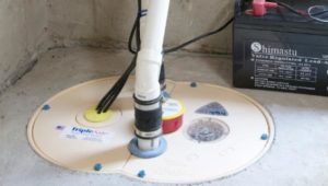 Sump pump installed in basement for waterproofing
