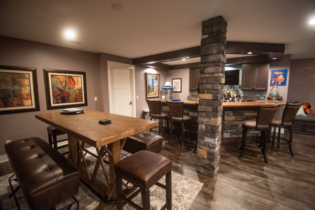 seating area for guests next to finished bar