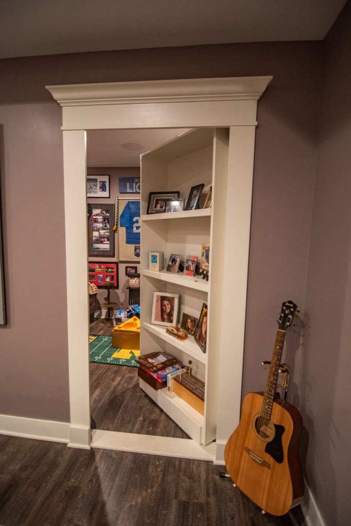 secret bookcase door leading to hidden room