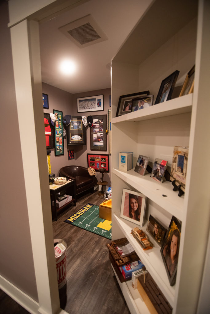 hidden cigar lounge behind secret bookcase door
