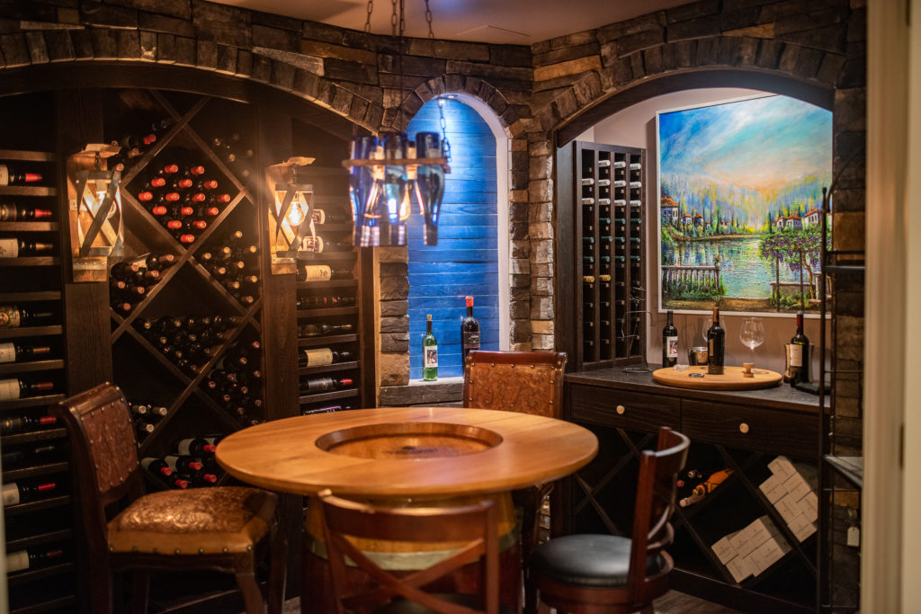 wine cellar with brick accents and wine shelving