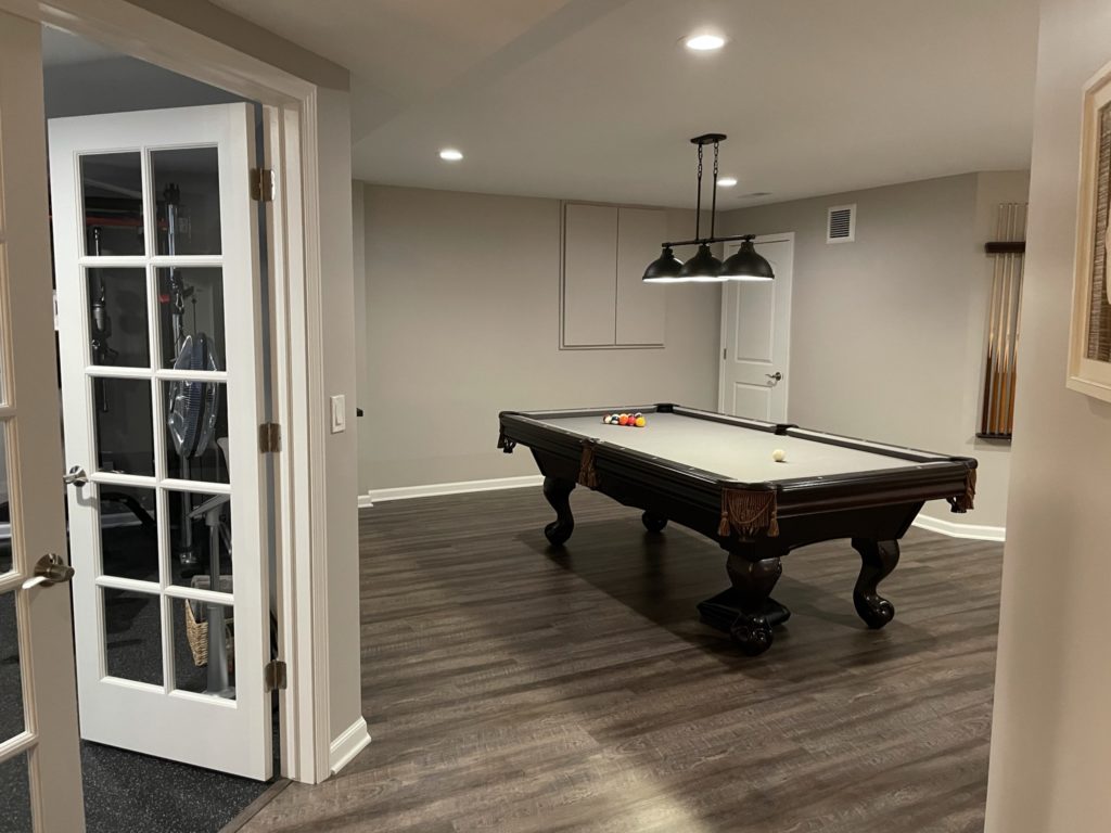 Northville, Michigan finished basement with pool table