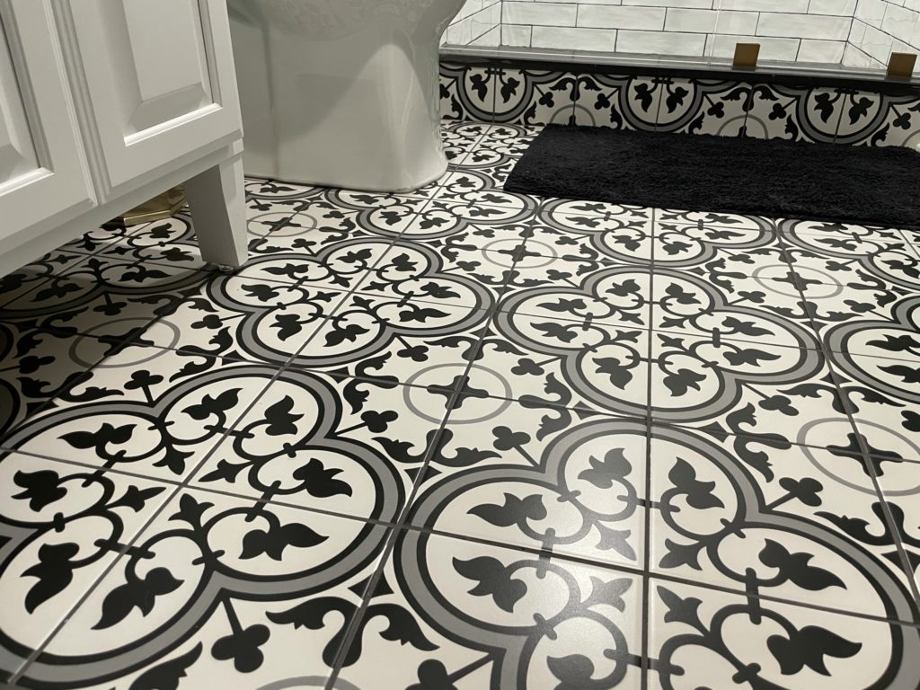Northville, Michigan finished basement bathroom with detailed tile