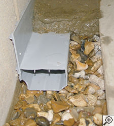 Drainage below basement floor