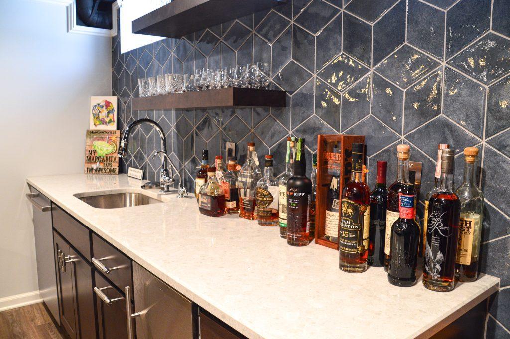 Finished basement home bar with tile backsplash in Farmington Hills, Michigan