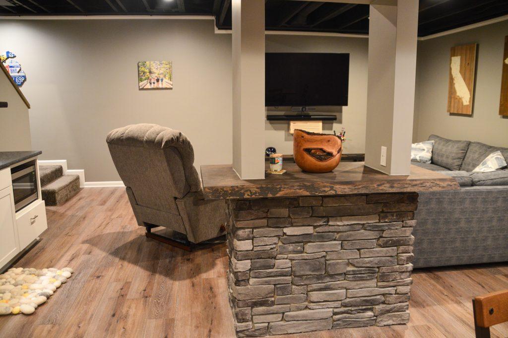 Finished basement living room and brick post cover in Ann Arbor, Michigan