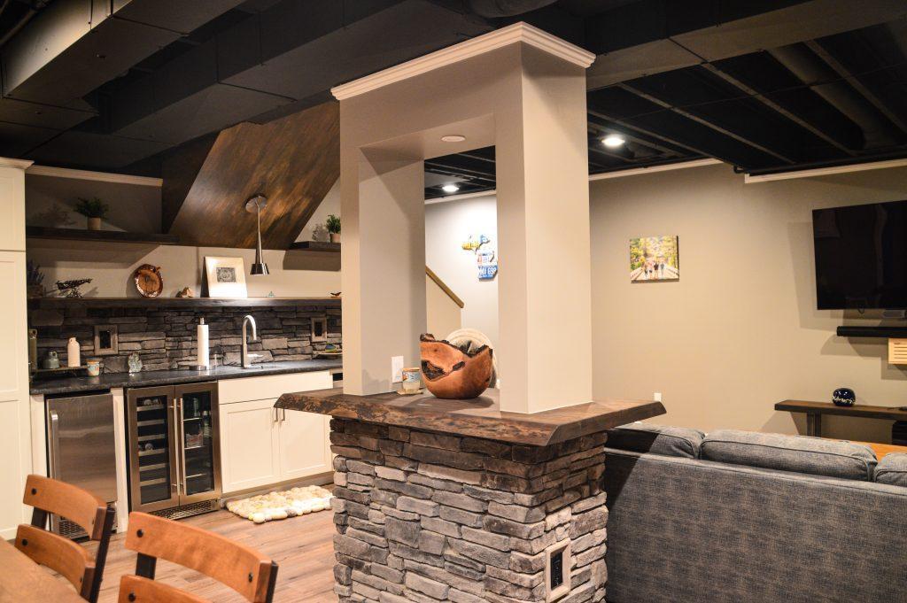 Finished basement brick support post cover in Ann Arbor, Michigan